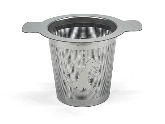 Front view of a stainless steel tea infuser with a T-Rex holding a cup of tea on it