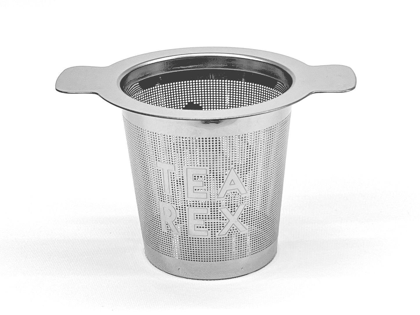 A rear view of a stainless steel tea infuser that sits in a cup