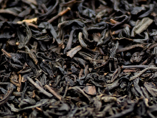 A close up of Lapsang Souchong smoked black tea from TEA23