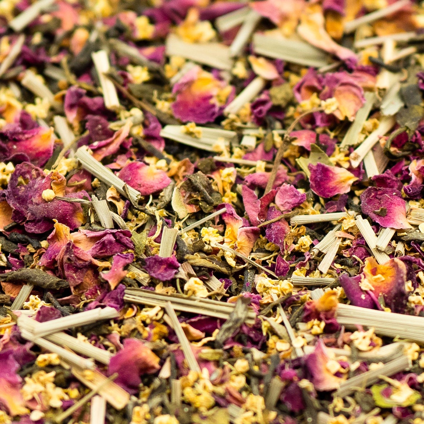 A pile of green tea, lemongrass, elderflower and rose petals. 