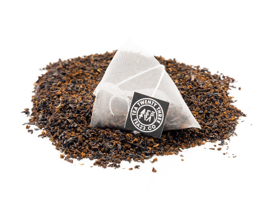 A close up of English Breakfast Tea in a pyramid tea bag from Tea23
