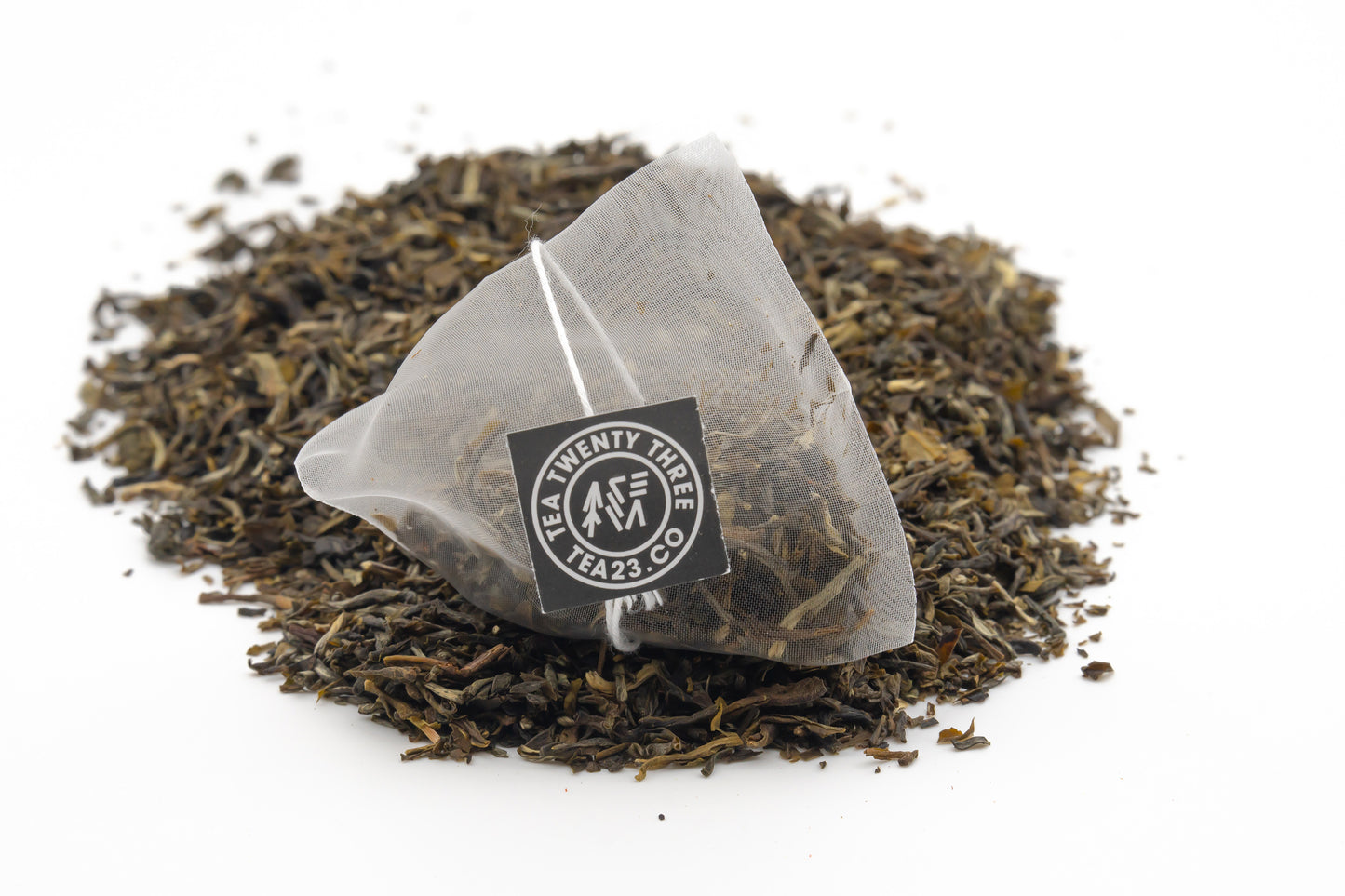 Yunnan Green tea in a pyramid tea bag from Tea23